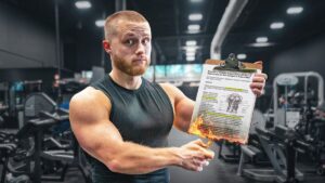 A muscular man in a gym holding a barbell, with the text "Science-Based Lifting 'Sucks'" in bold letters.