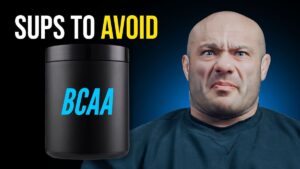 Thumbnail for video titled "Are You Wasting Money on Useless Supplements?" from Renaissance Periodization channel, featuring a person holding various supplement bottles with a skeptical expression.