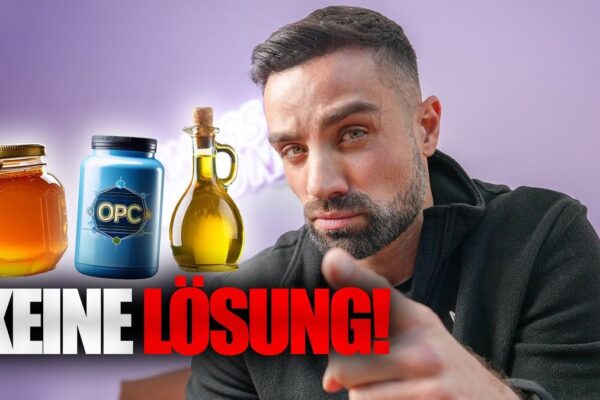 Vorschaubild des Videos "DIE FITNESS-LÜGE: Warum OPC, Leinöl & Co. völlig überbewertet sind!" vom Kanal Goeerki. Ein Mann in Sportkleidung steht mit verschränkten Armen vor einem Regal voller Nahrungsergänzungsmittel und schaut skeptisch in die Kamera.