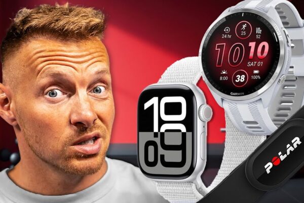 Vorschaubild des Videos: CoachStef trägt eine Apple Watch und eine Garmin-Uhr an den Handgelenken und zeigt sie in die Kamera. Der Hintergrund zeigt Fitnessgeräte. Text auf dem Bild: "Wie genau sind APPLE WATCH und GARMIN beim Kalorien Tracking? 7 TESTS".